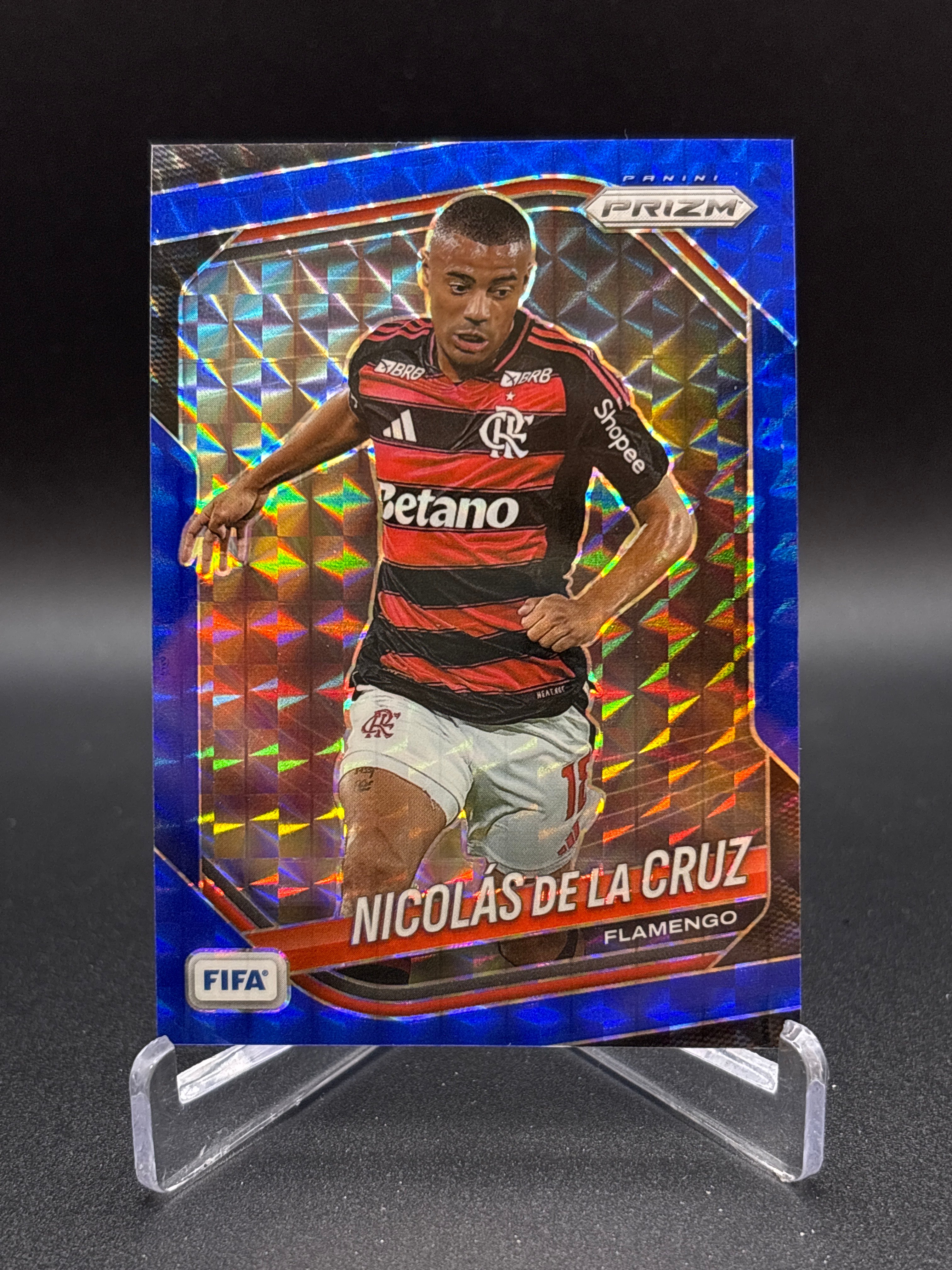 The 2025-26 Panini Prizm FIFA #284 Geny Catamo Blue Prizms trading card
